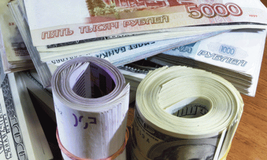 Доллар растет по отношению к рублю